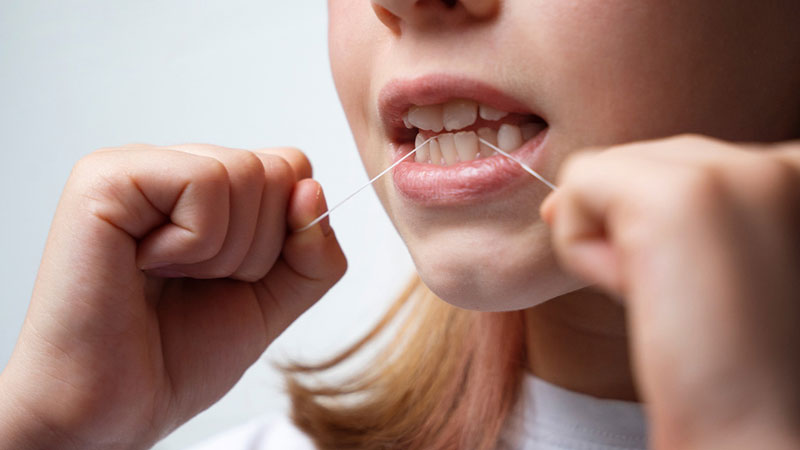 patient undergoing teeth check up for root canal 